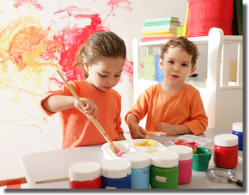 kids painting at Mountains of Fun Daycare Lynn Valley